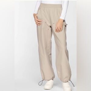 PXG WOMEN'S PERFORATED LOGO WIDE LEG TROUSER BOULDER